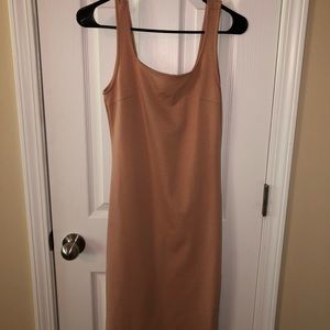 Blush pink, over the knee fitted dress.